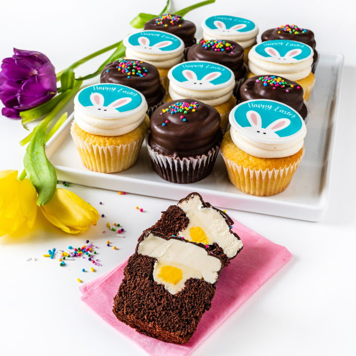 easter cupcakes on white serving tray