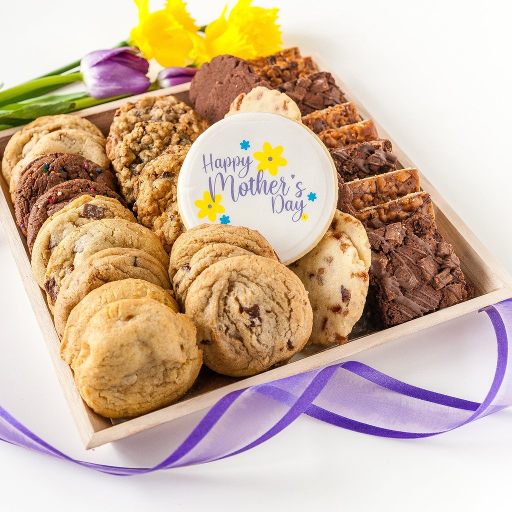 mothers day cookies on a tray. mothers day logo cookie on top of cookies