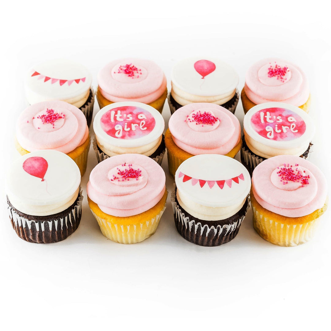 1 dozen It's a Girl cupcakes with balloons and banners / cupcakes  near me