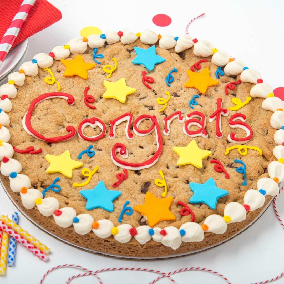12 inch round chocolate chip Cookie Cake Congrats message in buttercream and confetti and stars