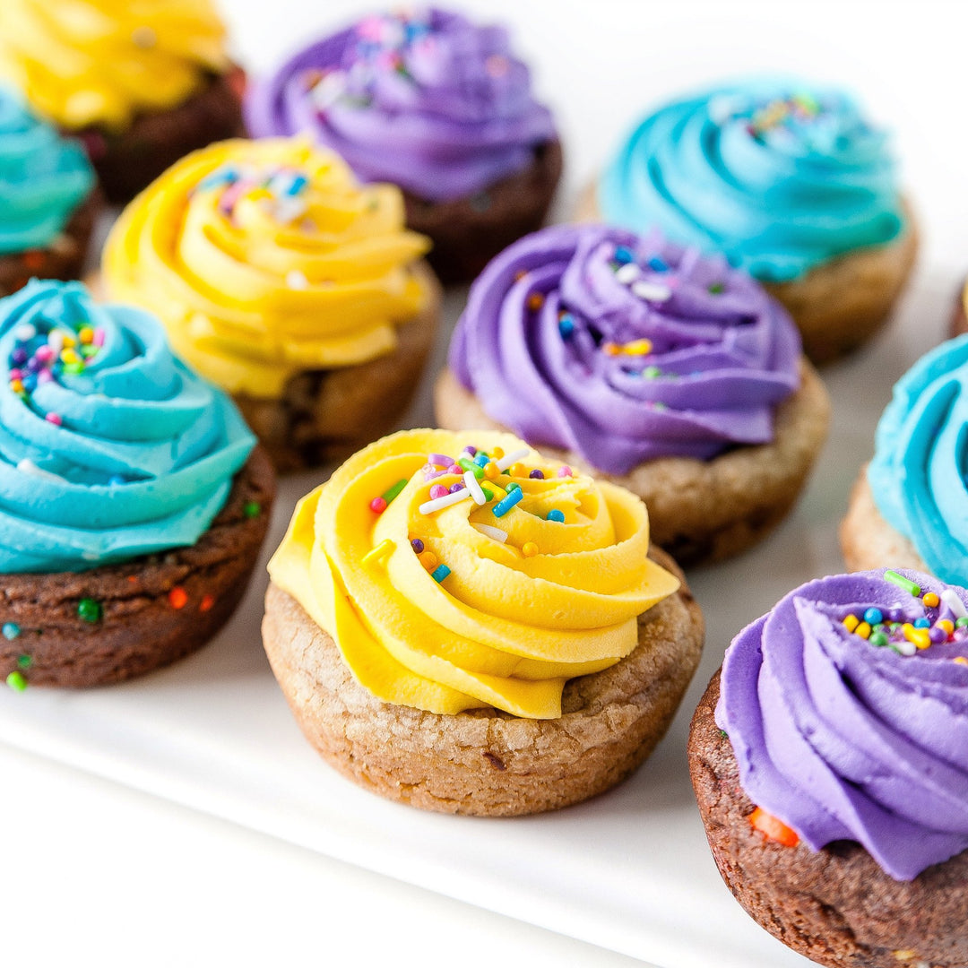 Cookie Cupcakes with Yellow, Blue and Purple Icing