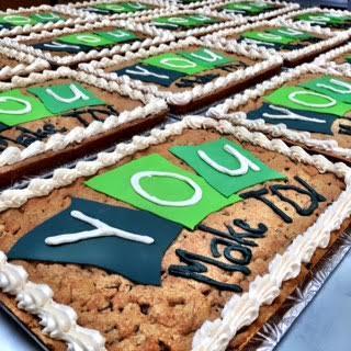 12 by 16 inch giant Cookie Cake with You Make TD message in green icing
