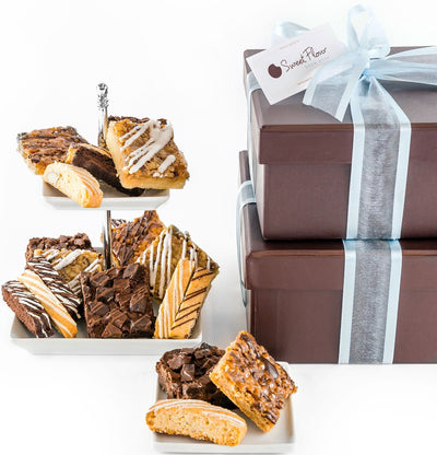 Baker's Select Signature Duo with assorted brownies, bars and biscotti in two brown boxes with blue ribbon
