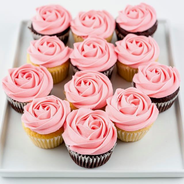 Chocolate and Vanilla Pink Rose Cupcakes on Plate