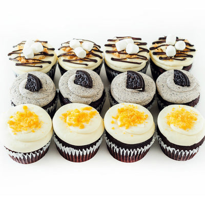 One dozen chocolate trio cupcakes with cookies and cream, salted caramel and s'mores
