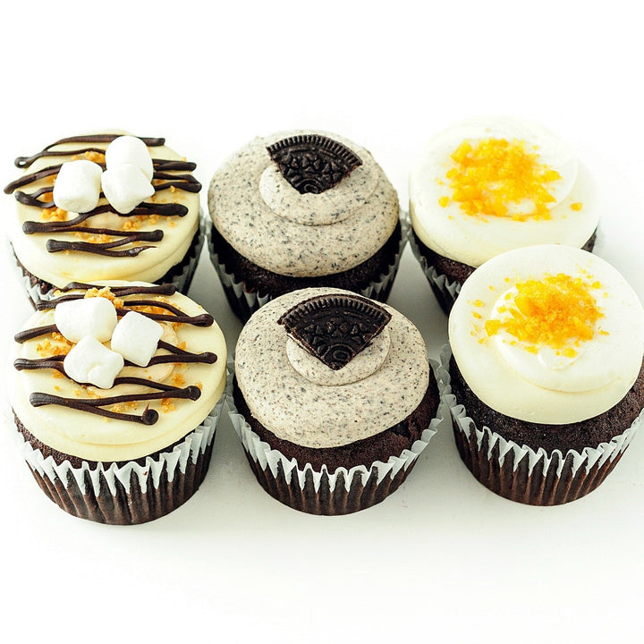 half dozen chocolate trio cupcakes with cookies and cream, salted caramel and s'mores