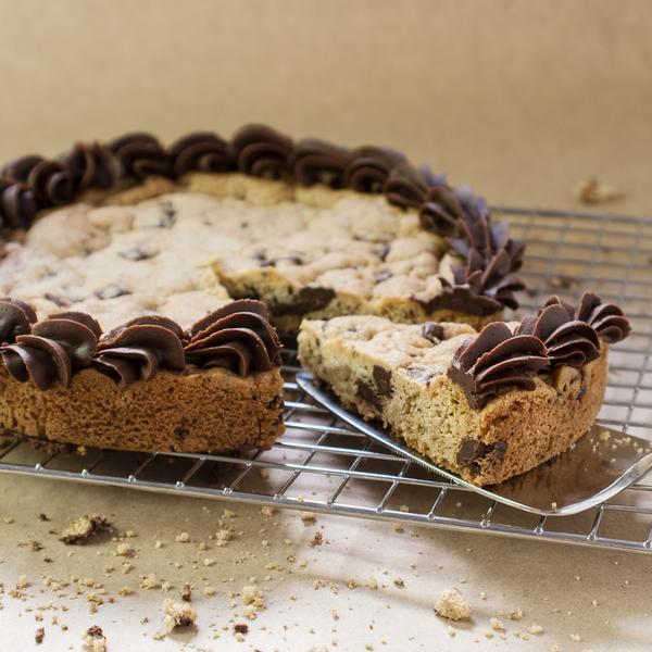 8 inch round chocolate chunk cookie cake with icing